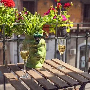https://etnea-flats.catania-hotels.net